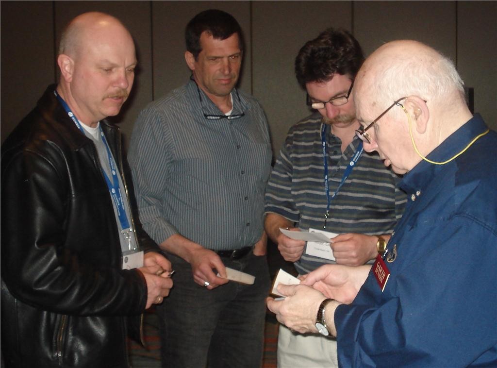 Delegates were anxious to spend a few moments with Garth Denison (r) following his chiller familiarization seminar at RSES Canada's conference.