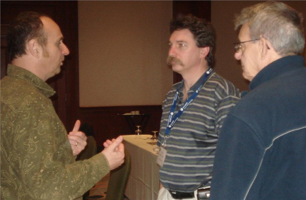 HPAC contributor Steve Goldie (l) of Fulford Supply chats with Curt Minor, CM, of Penn Refrigeration in Crystal Beach, ON and Brian Ball (r) of Fonthill, ON. Goldie shared an opportunity to grow contractors' businesses with delegates before explaining hydronic basics.