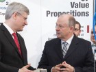 Prime Minister Stephen Harper and Christian Paradis, Minister of Industry and Minister of State (Agriculture), are given a tour of the CO2 Solutions Inc. facility by Glenn Kelly, president and CEO of CO2 Solutions Inc.