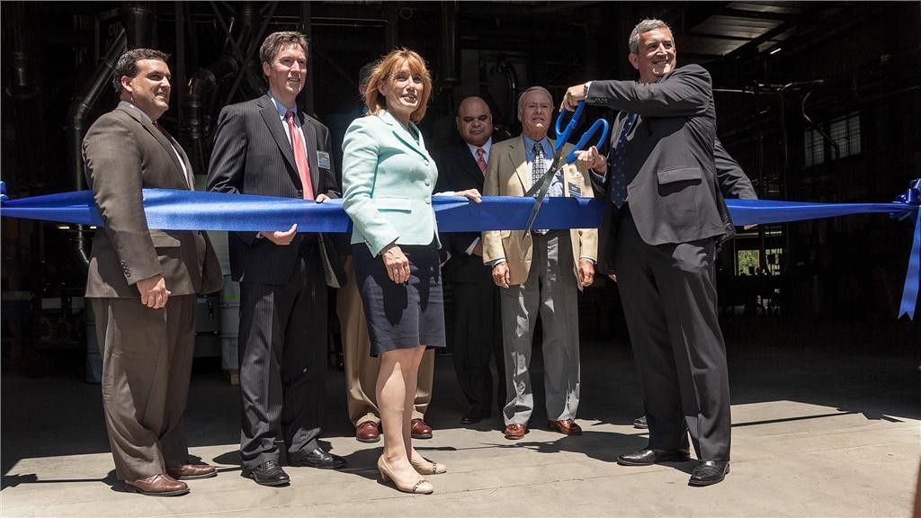 New Hampshire Governor Maggie Hassan (foreground left) looks on as Watts Water Technologies CEO and president David Coghlan gets set to cut the ribbon at the Lead Free facility. Photo ImagesPlus Photography