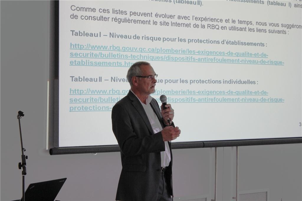 Henri Bouchard presents his backflow seminar.