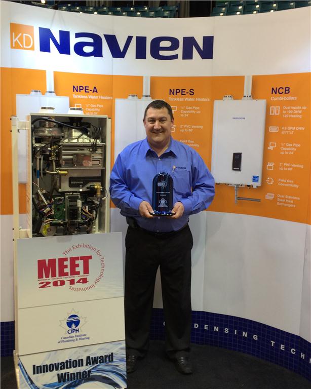 Mark Williamson, Navien's Canadian general manager, proudly holds Navien's CIPH Innovation Award for the new NCB Combi-boiler.