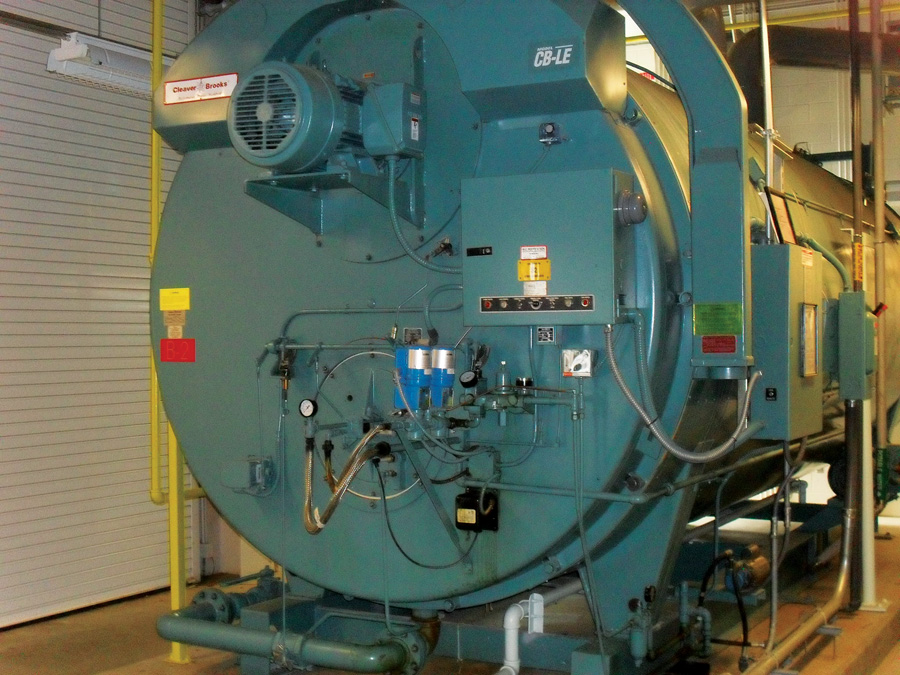 Front of a typical boiler with the burner and controls installed.