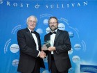 Charles Armstrong (l), chairman of Armstrong Fluid Technology accepts the 2014 European Frost & Sullivan Award for Customer Value Leadership from Jeff Frigstad, senior global vice president, best practices, Frost & Sullivan.