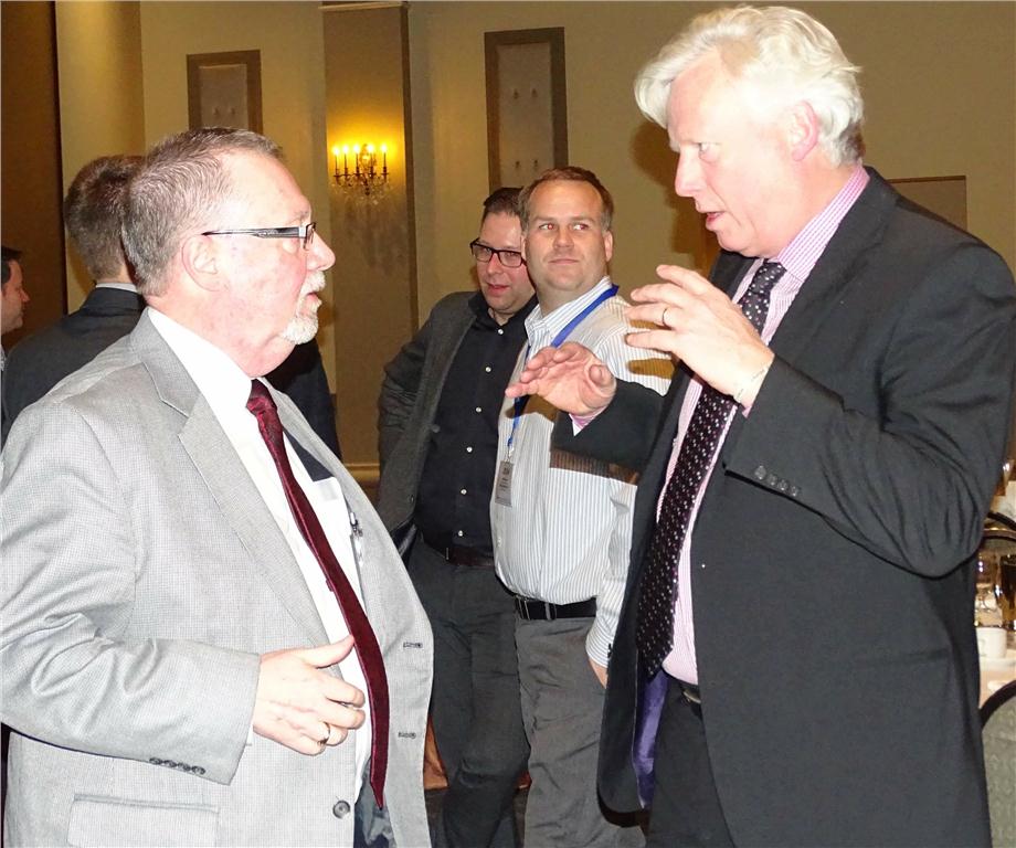 David Miller, former Mayor of Toronto chats with Dennis Costello, CIPH ON Region president (l) after his presentation on winning the bid and preparing for the Pan Am Games at the CIPH ON Region business meeting on January 15.