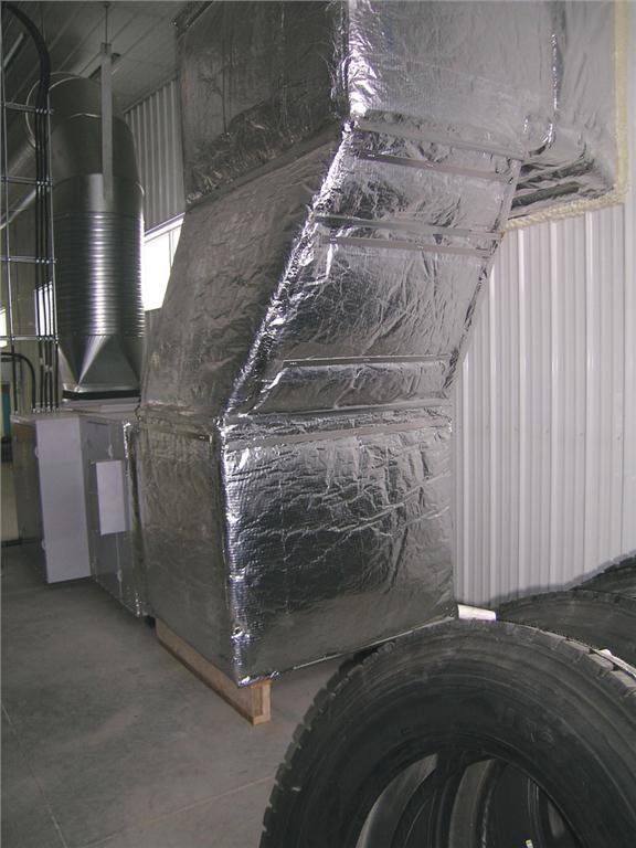 Direct fired make up air unit. Insulated intake air in foreground, supply air in background.