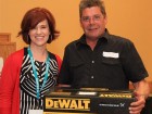 Melanie Peet-Winkfield, Desco sales representative with Garry Sullivan of Sullivan Plumbing and Heating, a door prize winner.
