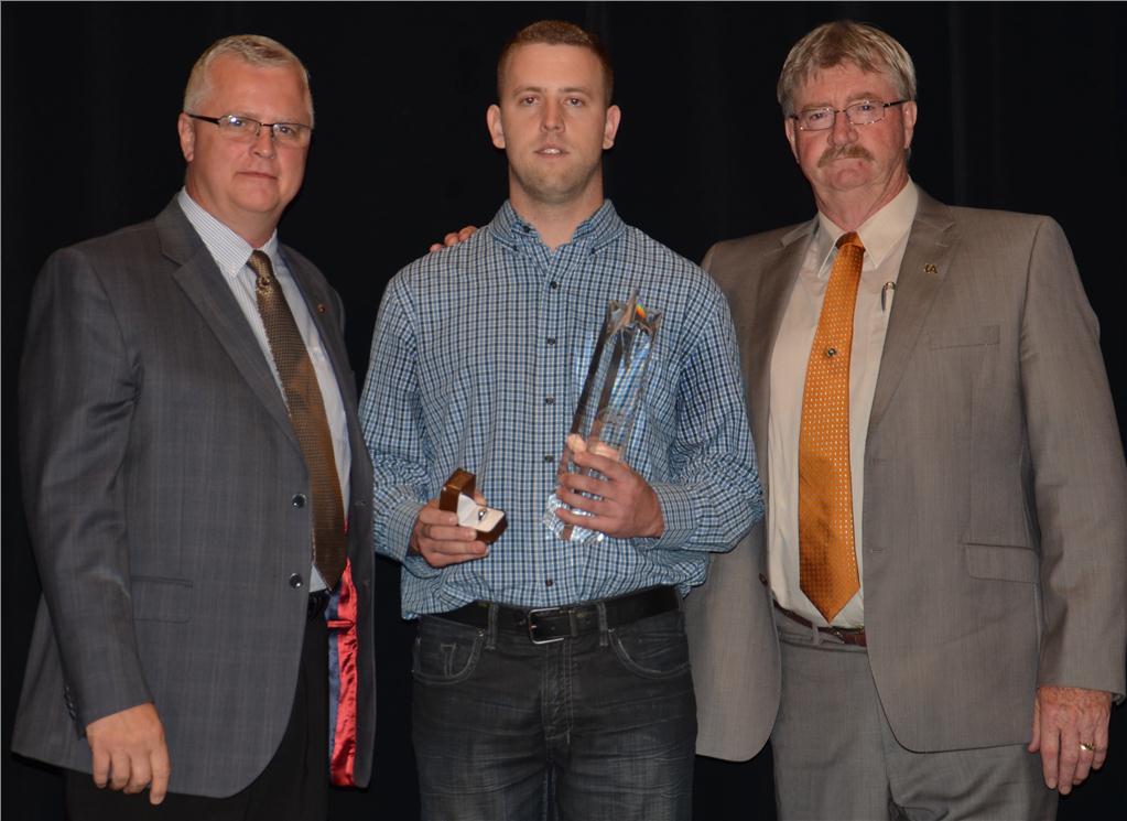 Brandon Ness of Local 787 was the national winner in the HVAC/R category. He is flanked by the UA's Larry Slaney (left) and John Telford.