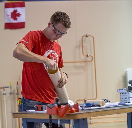 Kendrick Howe competes in the Plumbing and Heating contest area of WorldSkills 2015 in Sao Paulo, Brazil.