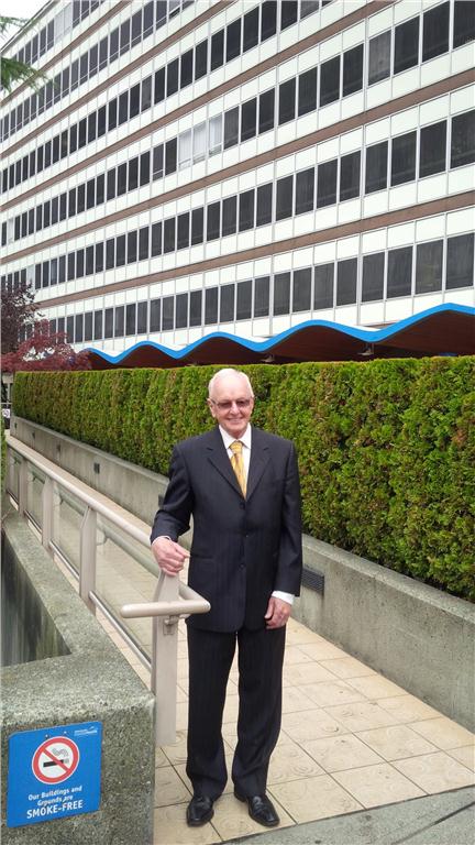 Paul Myers stands in front of the existing acute care tower at Lions Gate Hospital that has been named in his honour. Photo Lions Gate Hospital Foundation