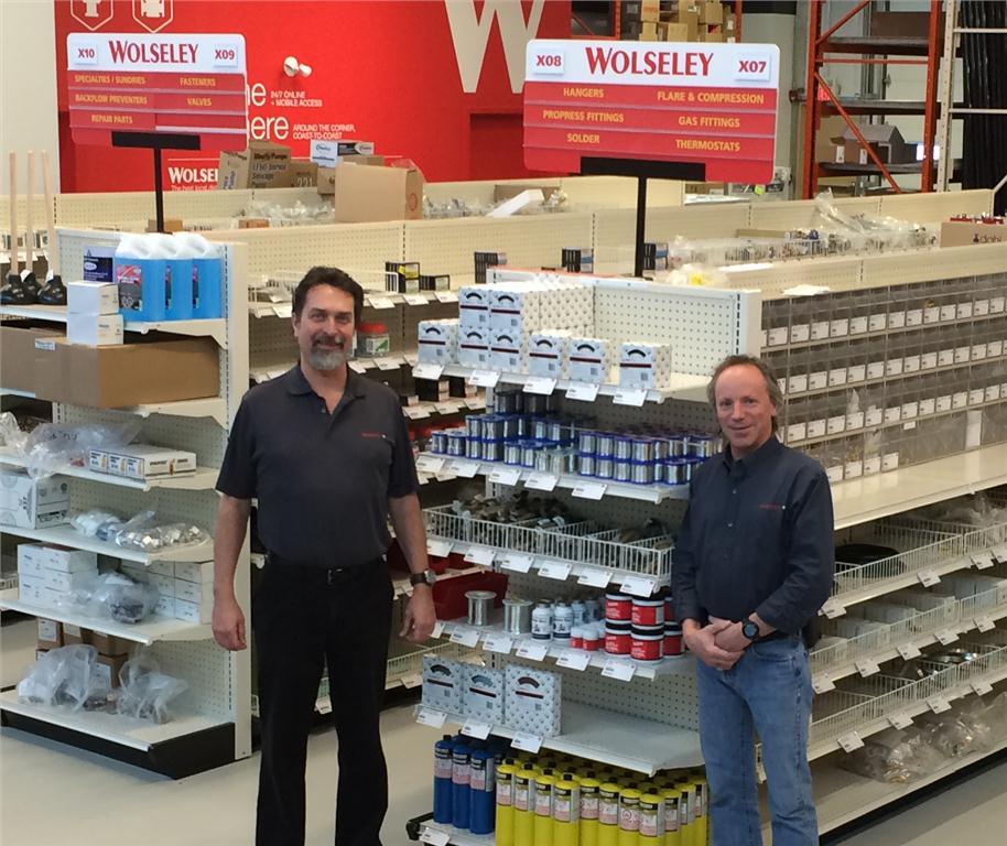 The team at Wolseley's new plumbing and HVAC/R branch in Airdrie, AB. Ivar Vaag (l), branch manager and Norbert Holzmann, counter sales.