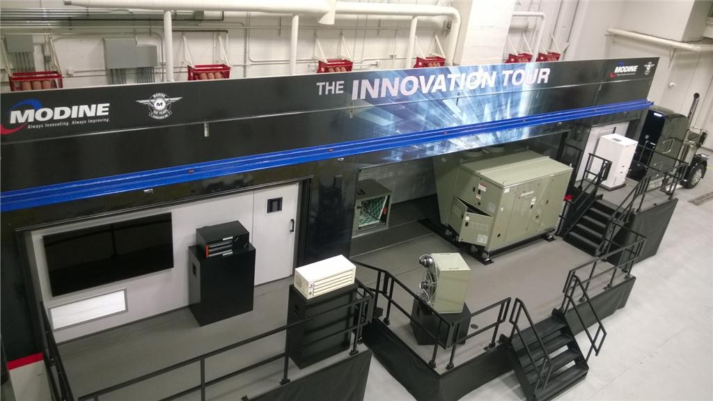 The trailer includes an Atherion packaged rooftop ventilation system, an operating school HVAC unit, an interactive Modine controls system module, the newly AHRI-certified geothermal systems, and finally, Effinty and Hot Dawg unit heaters.
