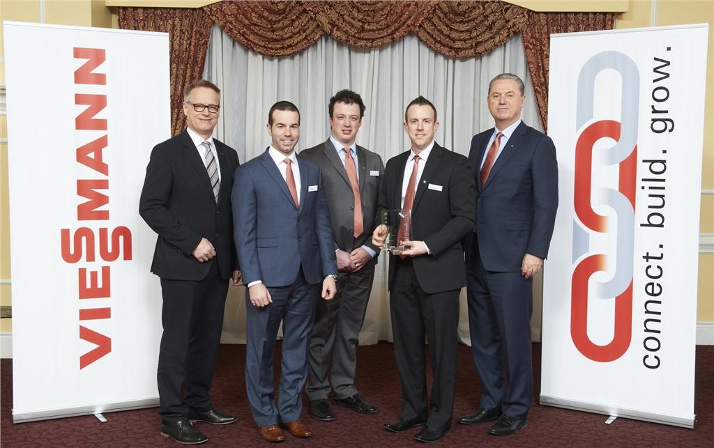 MAX first prize winner (l to r), Armin Fleck, Viessmann's director of international sales-western hemisphere, Simon Guerin, Thierry Wright and Steeve Fournier of DisTech Inc., and Ken Webster, director of sales and marketing with Viessmann-Canada.