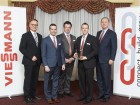 MAX first prize winner (l to r), Armin Fleck, Viessmann's director of international sales-western hemisphere, Simon Guerin, Thierry Wright and Steeve Fournier of DisTech Inc., and Ken Webster, director of sales and marketing with Viessmann-Canada.